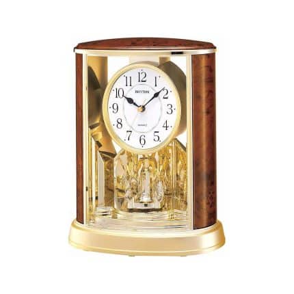 Reloj de sobremesa Rhythm dorado péndulo rotatorio comprar relojes de sobremesa en pamplona regalos boda de oro plata aniversario joyerías juan luis larráyoz
